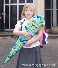 Starting school: with the Schultüte in front of the Church