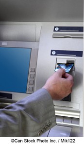 Card being inserted into Cashpoint - ©Can Stock Photo Inc. / Mik122