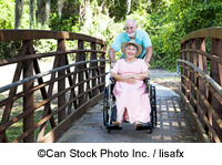 A couple with a wheelchair - ©Can Stock Photo Inc. / lisafx