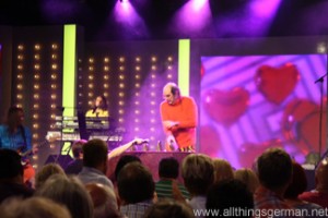 Guildo Horn plays the cowbells during the Hessentag in Oberursel