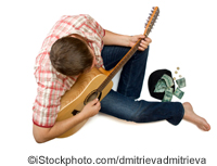 A street musician - ©iStockphoto.com/dmitrievadmitrieva