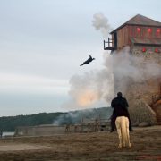 A stuntman falling from the tower