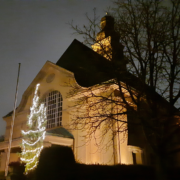 The Christuskirche in Oberursel lit up at night