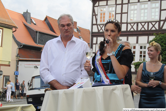 Brunnenkoenigin Vanessa I. with Brunnenmeister Harry Hecker at the opening of the wine festival