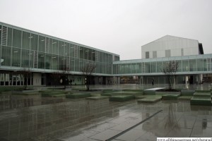 The courtyard among the new buildings with skylights from the sports hall