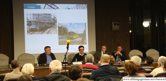 Rainer Willig, Michael Rüffer, Christof Fink and Arne Behrens on the podium at the public transport information evening