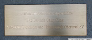 The plaque on the wall outside the entrance to the archive