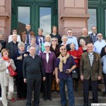 The classes of 1953 at their reunion on the school steps