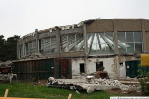 One side of the old indoor swimming pool being demolished