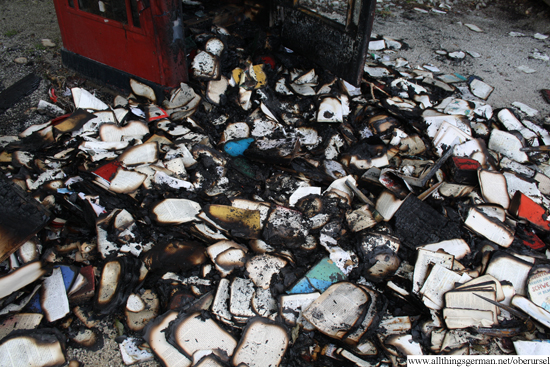 Charred remains of the books in the Rushmoor Park