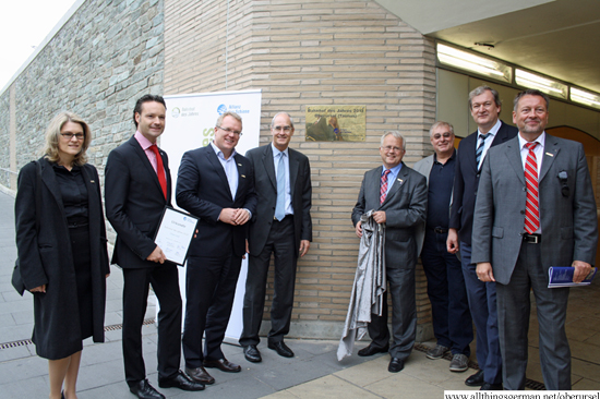 Unveiling the brass plaque at the new subway