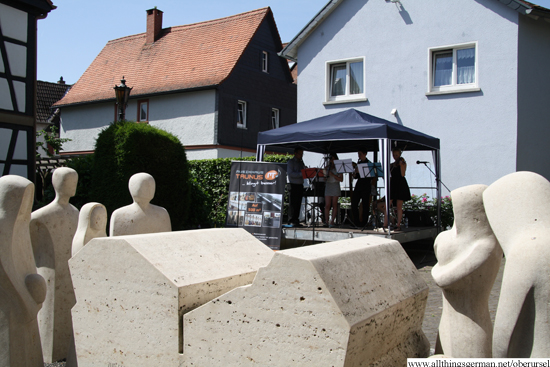 Crotchets playing next to the Victims' Memorial