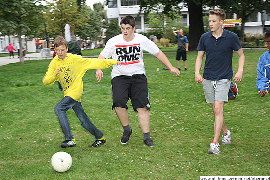 Lino, Pascal and Athim playing football