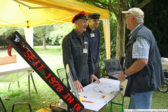 Operations manager Hans Kabbe (left) and Tobias Weber explaining the the plans for the new site to Manfred Kunz (right), who was at the opening of the current grounds in 1979.