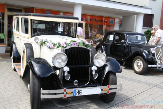 A vintage car on display at the Epinay-Platz during Autos in der Allee 2014