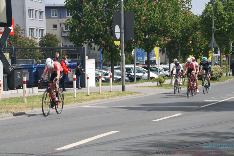 The "Junioren" race passing the railway crossing at Camp King - Tuesday, 1st May, 2018