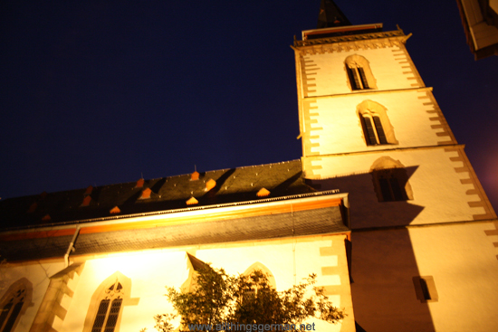 The St. Ursula Church in Oberursel during a full moon, coming from the Hollerberg